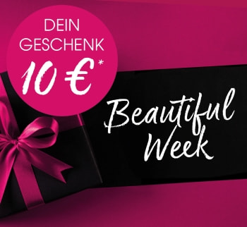 Breites Werbebanner mit pink-schwarzem Design: Links liegt ein schwarz verpacktes Geschenk mit pinker Schleife. Daneben ein pinker Kreis mit der weißen Aufschrift „Dein Geschenk 10 €*“. Rechts steht groß in weißer Pinsel-Schrift „Beautiful Week“ auf einem schwarzen Balke